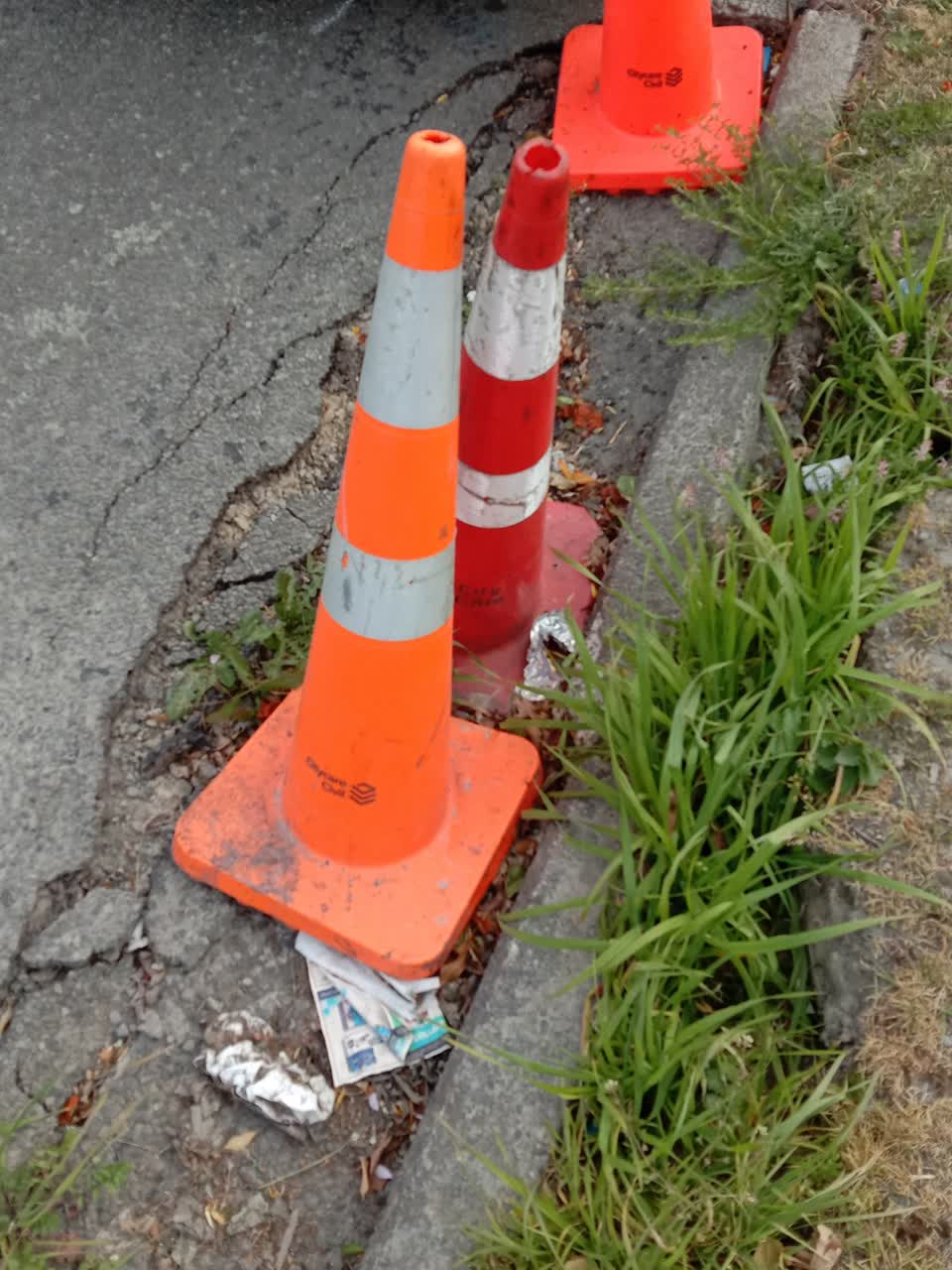 The photograph attached to this damaged road report
