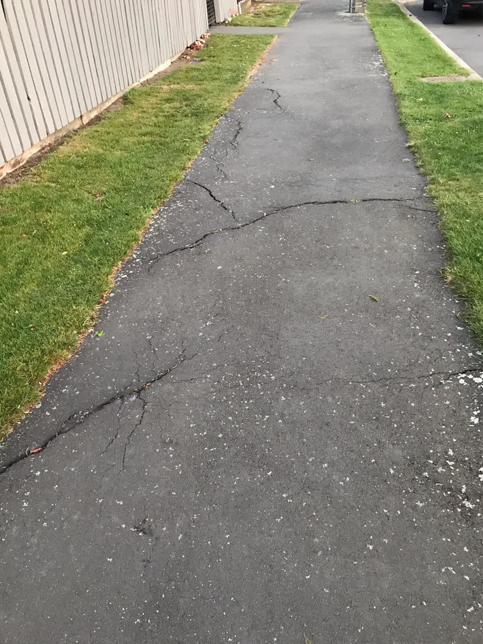 The photograph attached to this pavement - damaged report