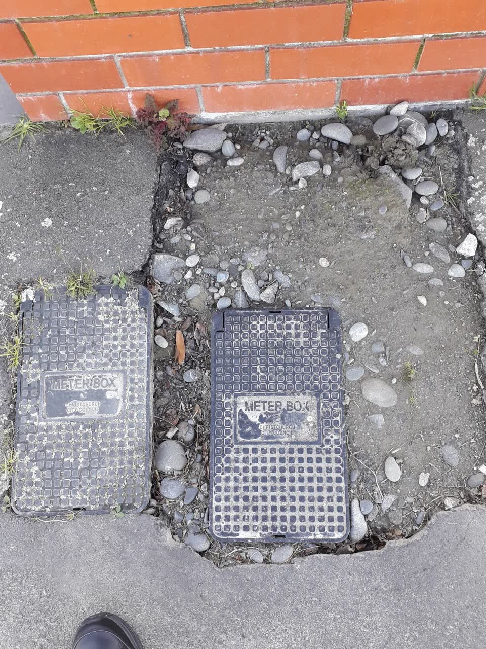The photograph attached to this pavement - damaged report