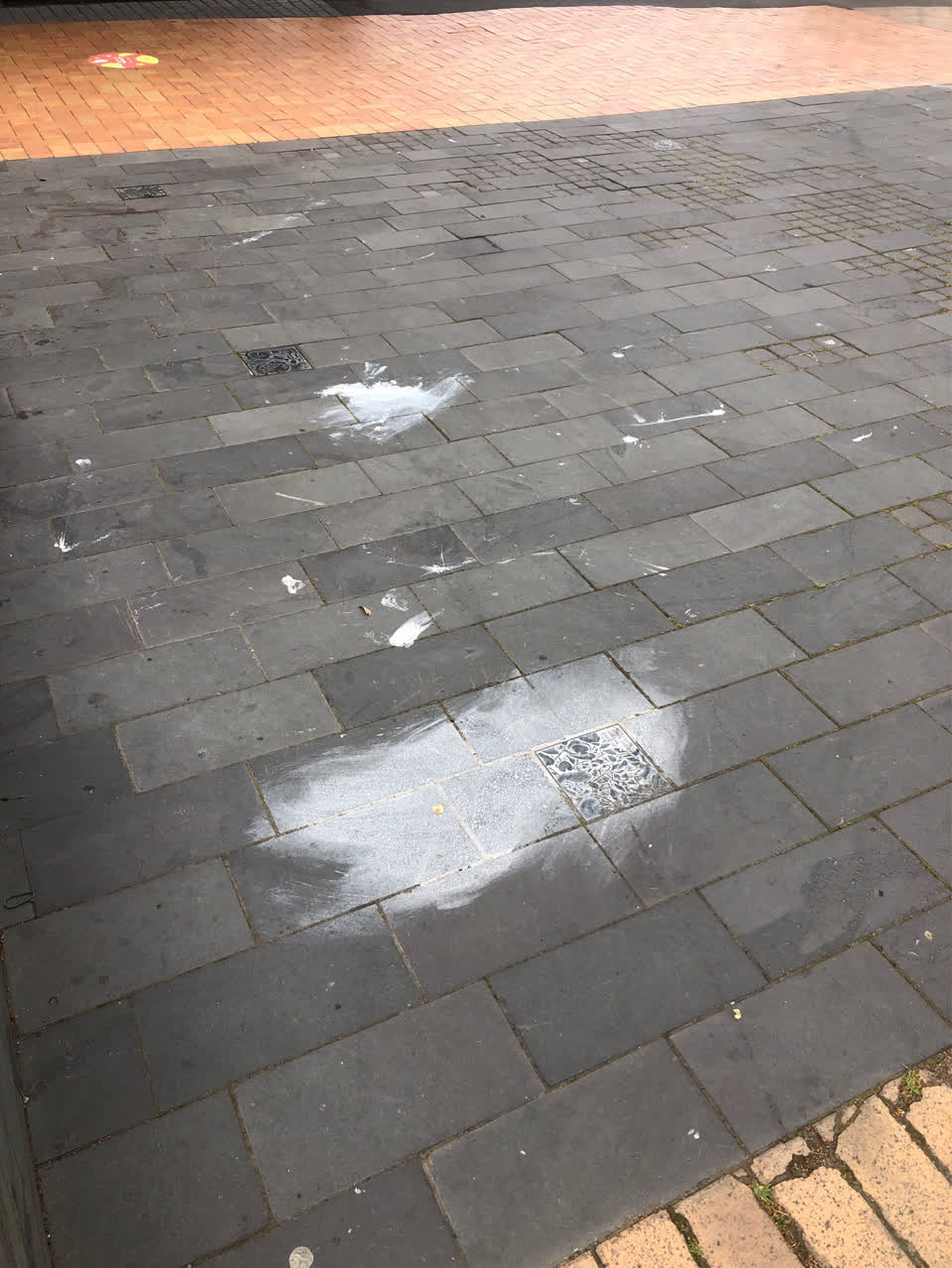The photograph attached to this pavement - damaged report