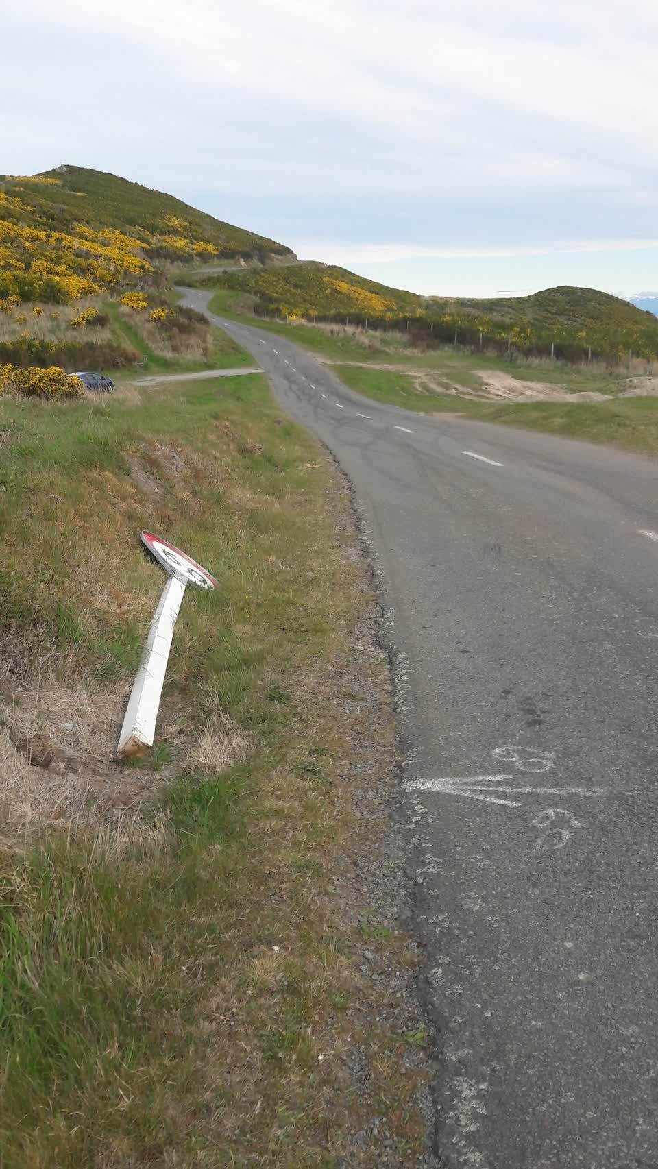The photograph attached to this damaged street sign report