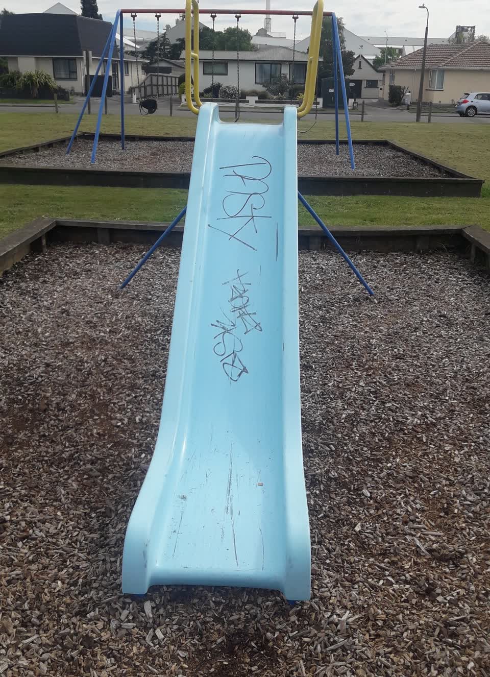 The photograph attached to this playground equipment report