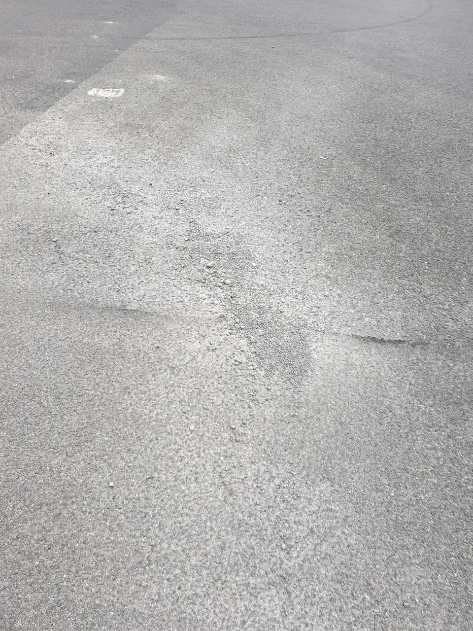 The photograph attached to this damaged road report