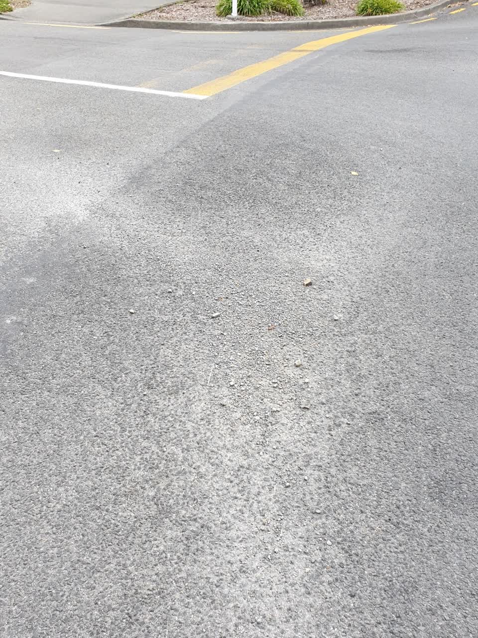 The photograph attached to this damaged road report