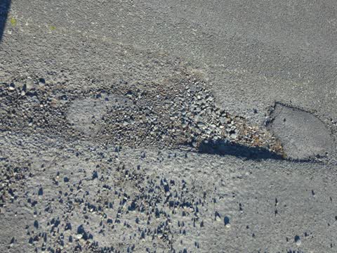 Pothole, a report photo