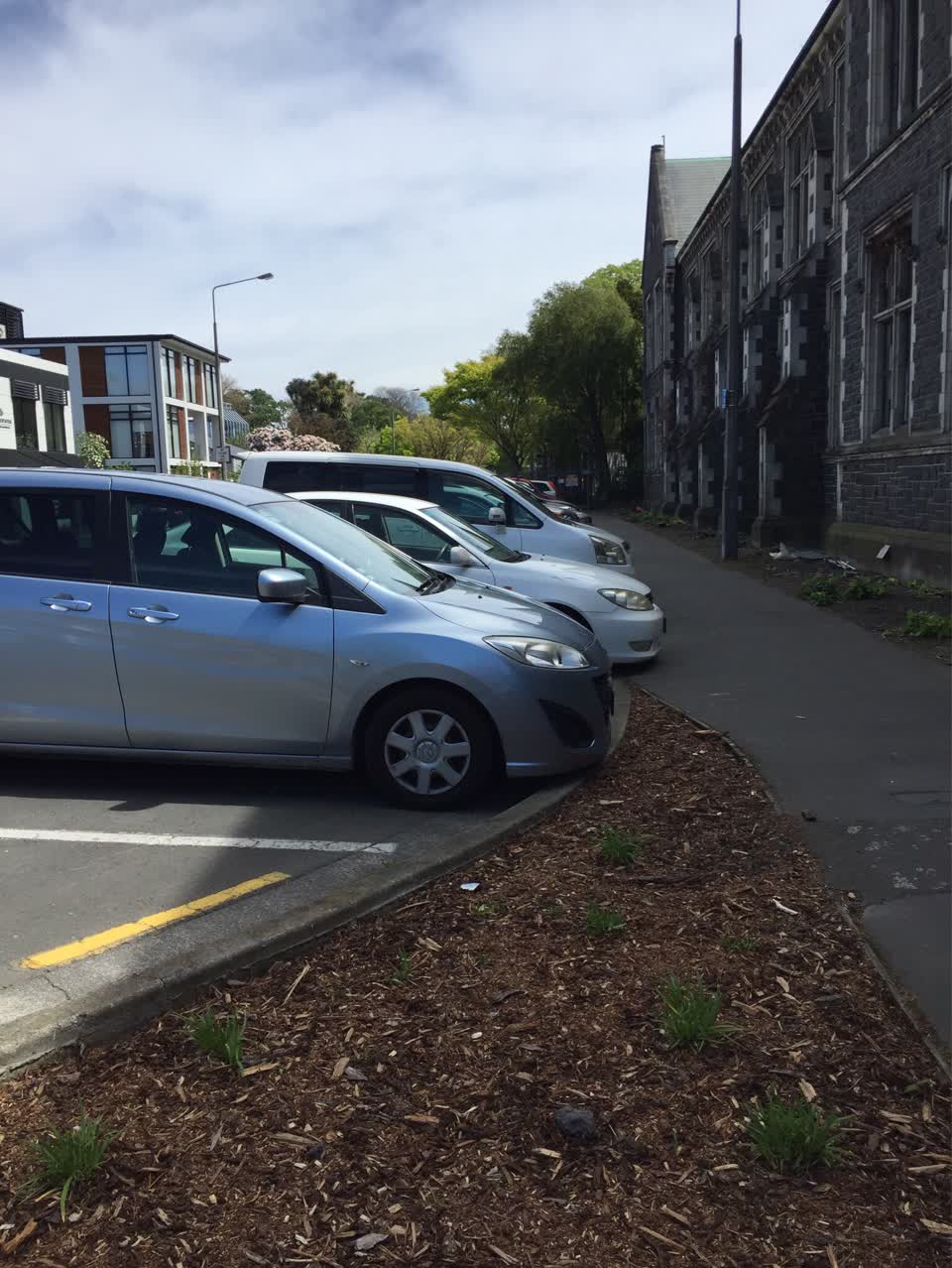 The photograph attached to this damaged street sign report