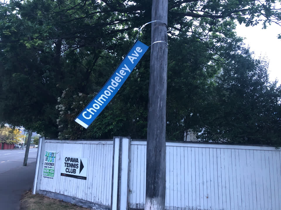 The photograph attached to this damaged street sign report