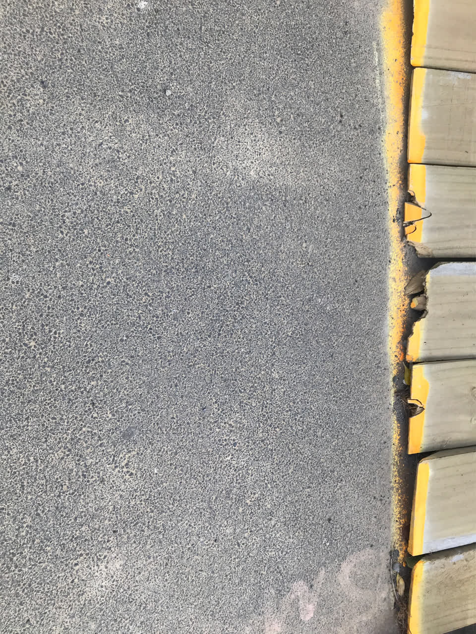 The photograph attached to this pavement - damaged report