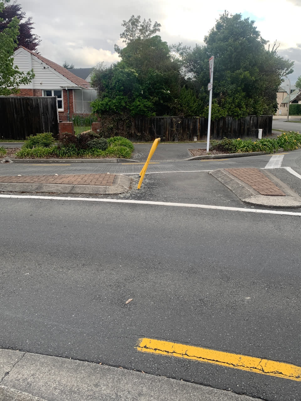 The photograph attached to this pavement - damaged report