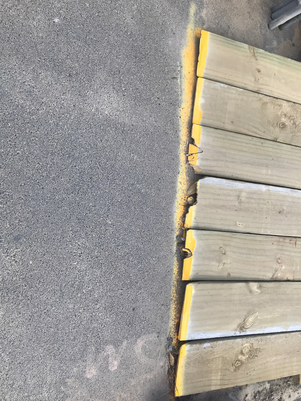 The photograph attached to this pavement - damaged report