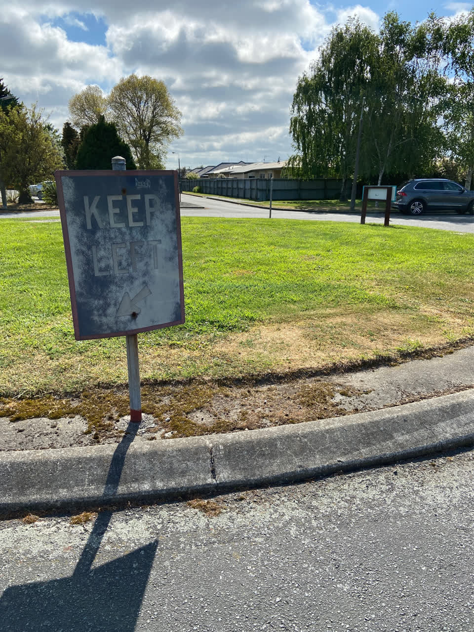 The photograph attached to this road signage report