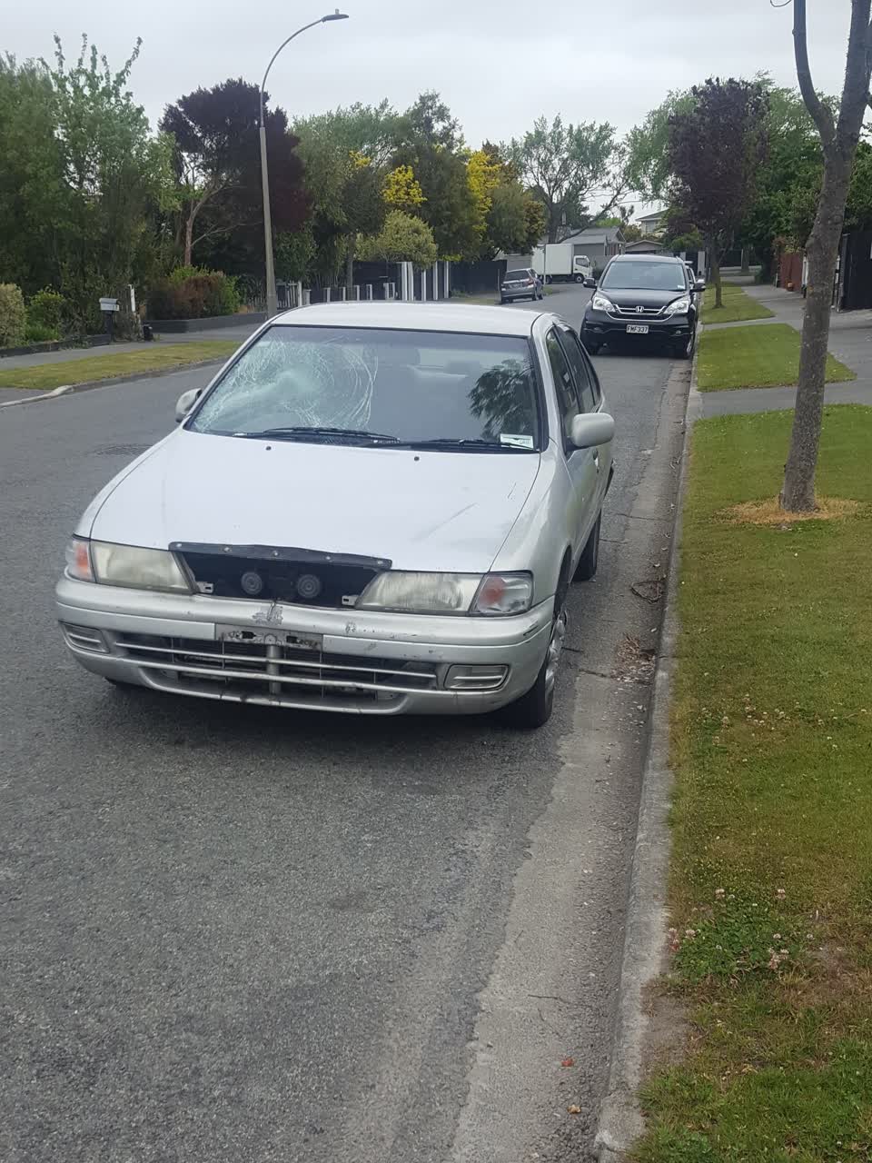 The photograph attached to this abandoned vehicle report