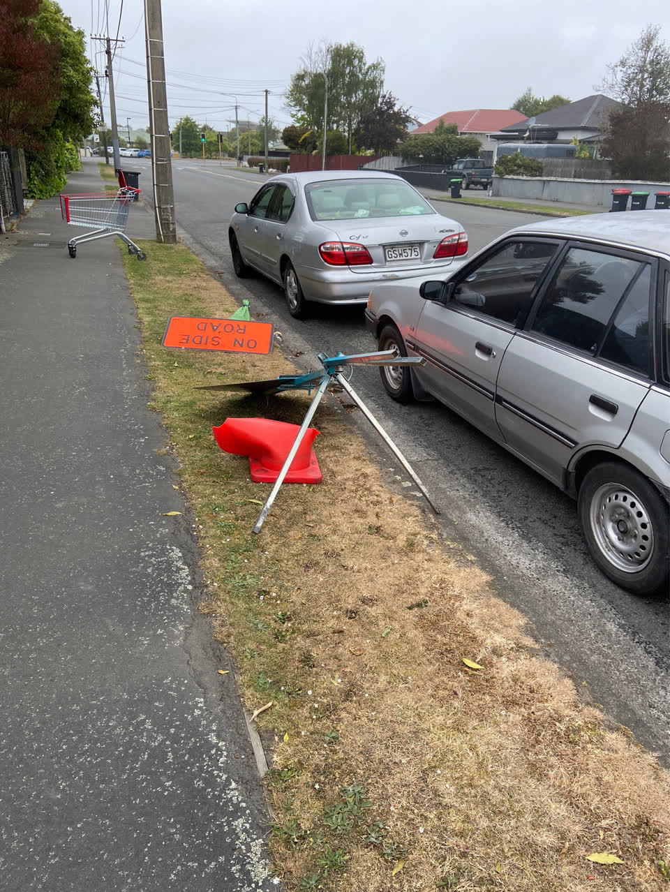 The photograph attached to this road signage report