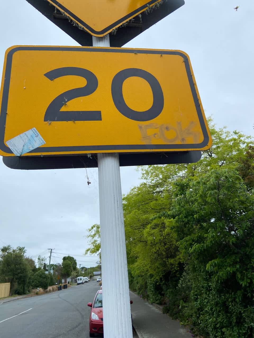 The photograph attached to this road signage report