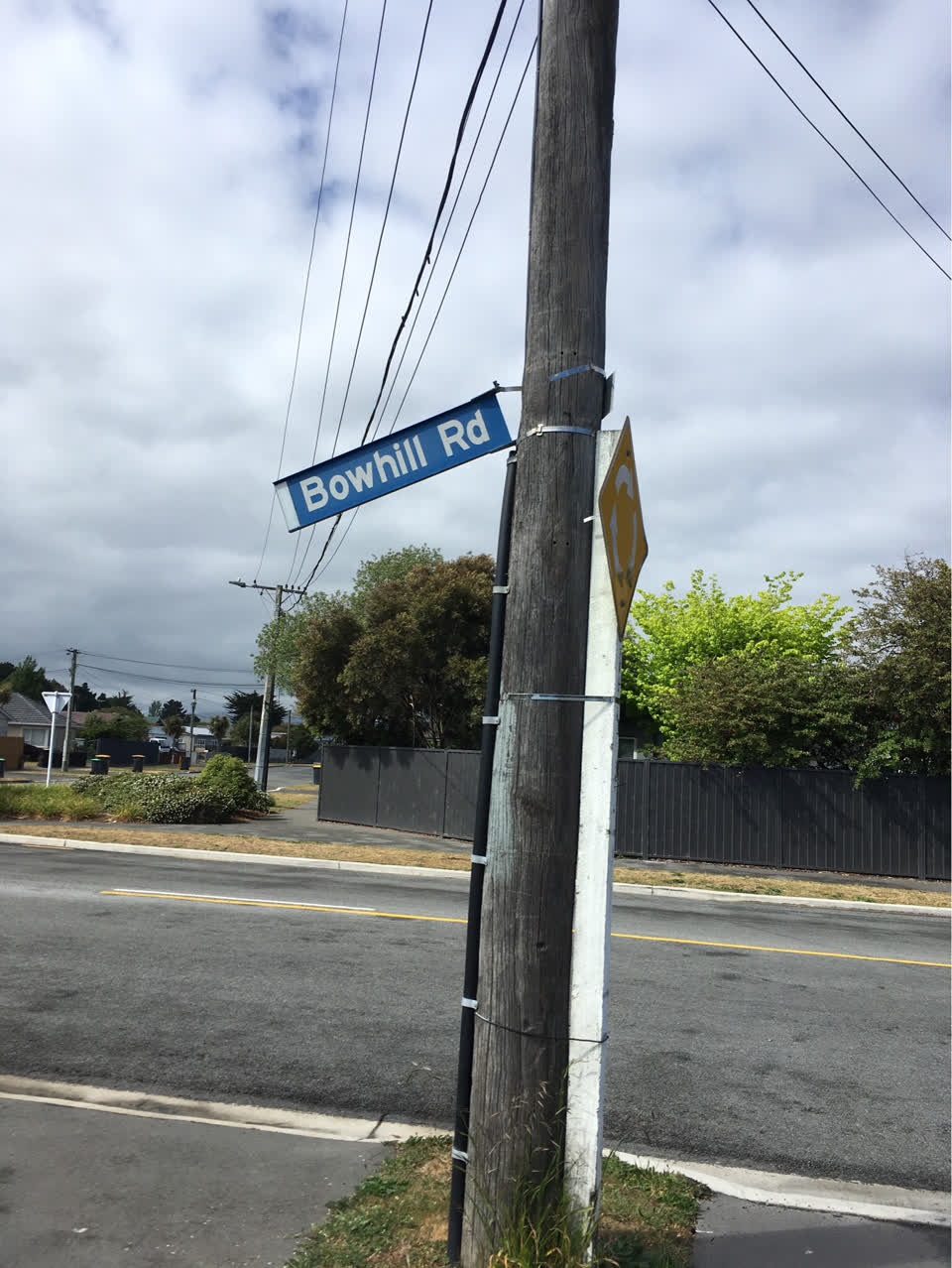 The photograph attached to this damaged street sign report