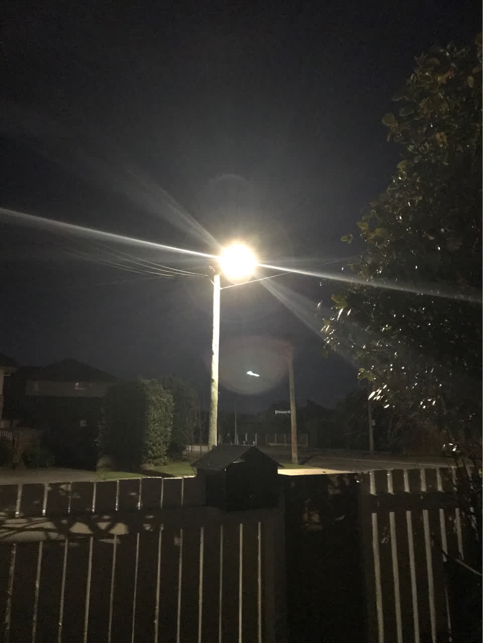 The photograph attached to this street light outage report