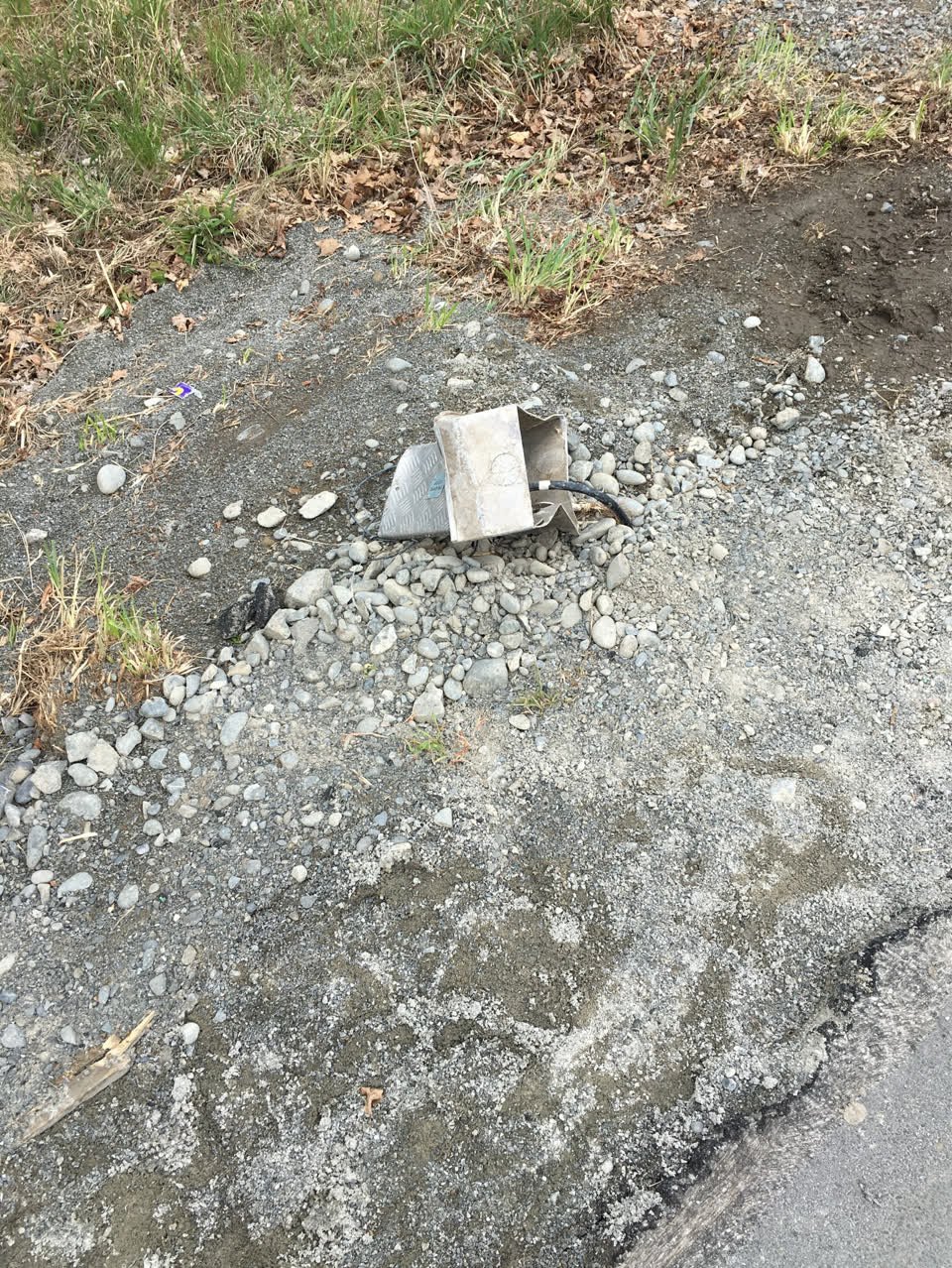 The photograph attached to this street light outage report