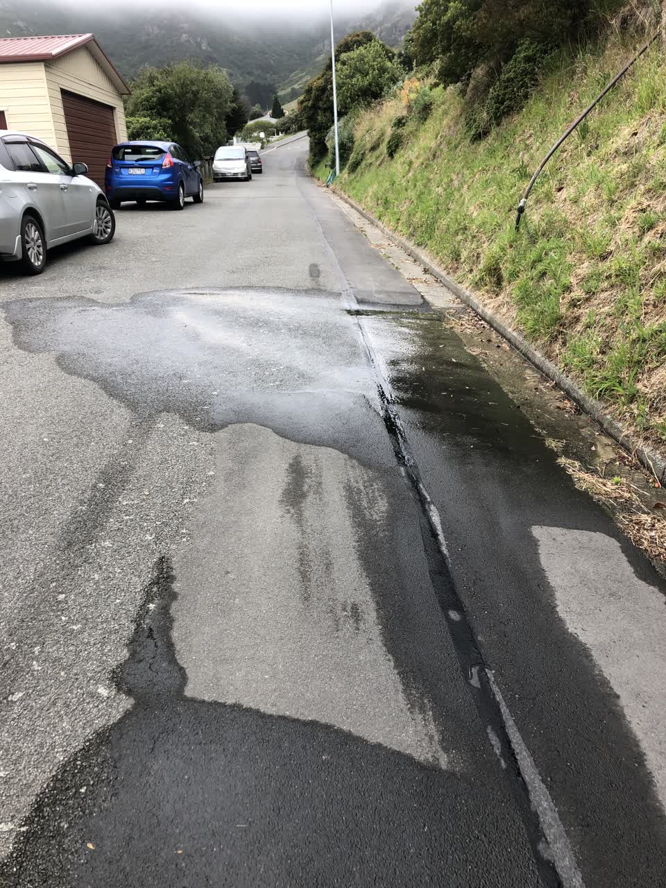 The photograph attached to this water leak report