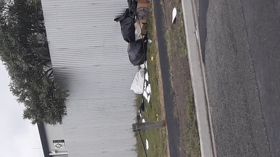 The photograph attached to this rubbish/recycling report