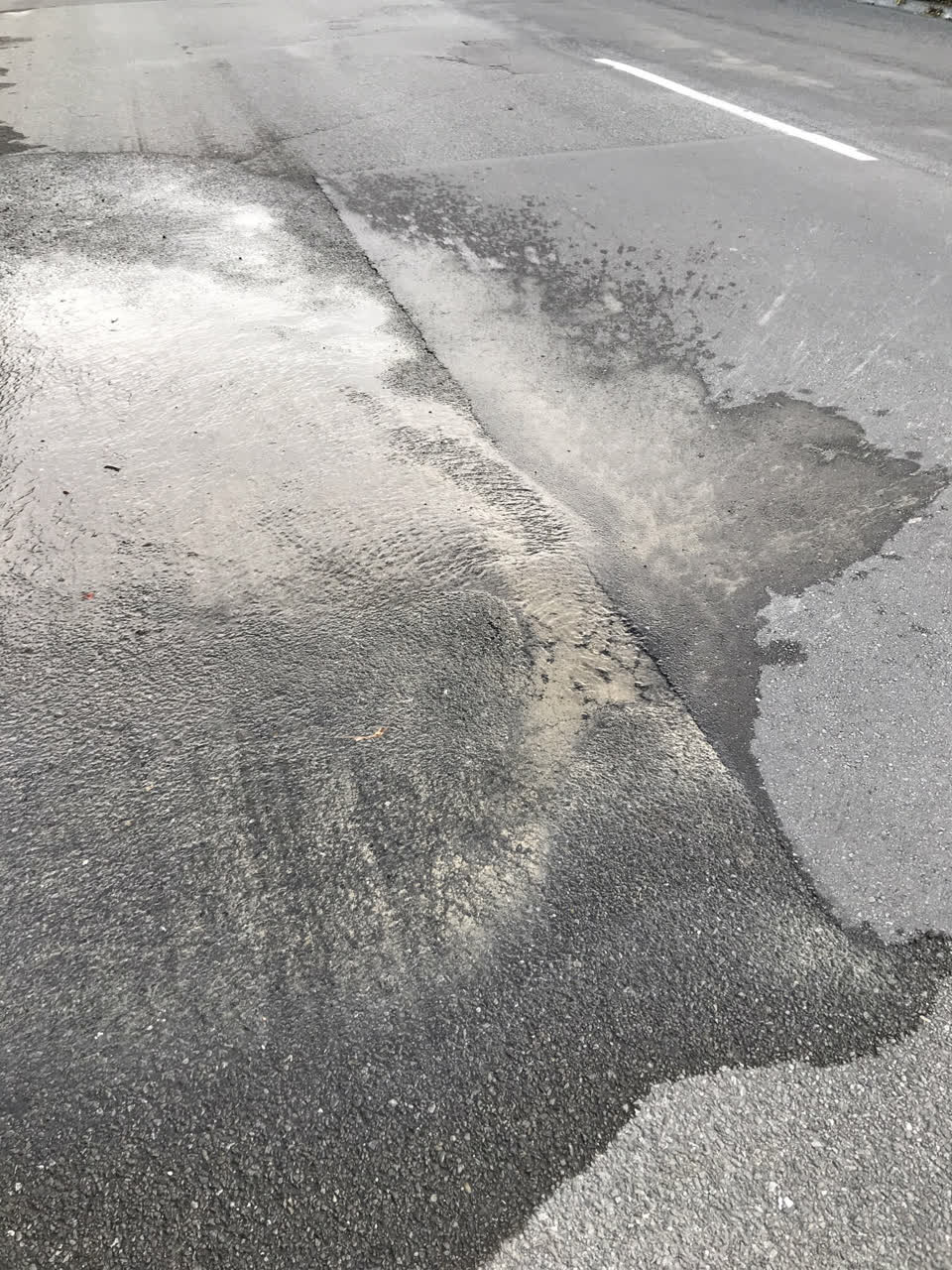 The photograph attached to this water leak report