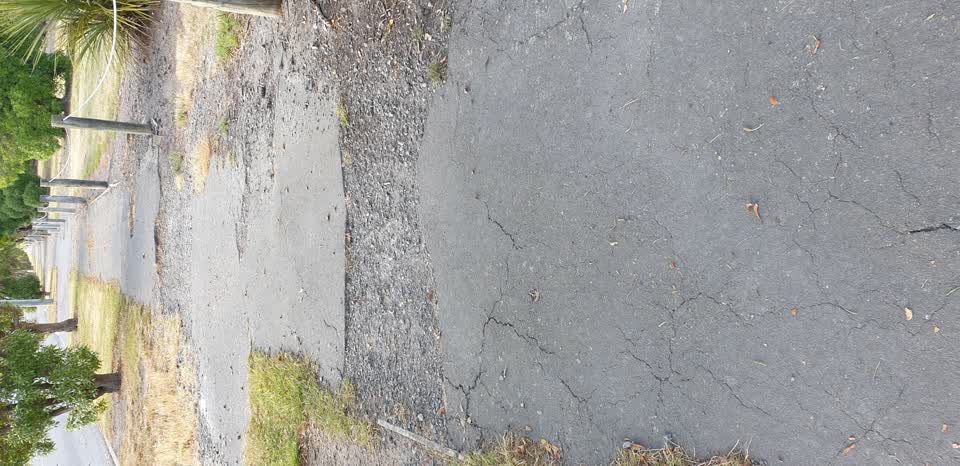 The photograph attached to this street light outage report