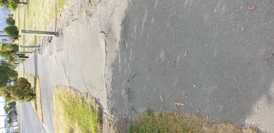 The photograph attached to this street light outage report