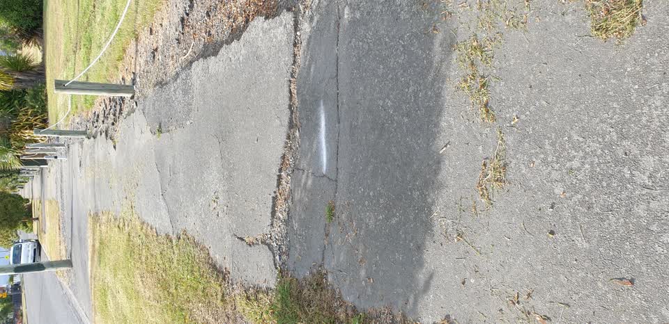 The photograph attached to this street light outage report