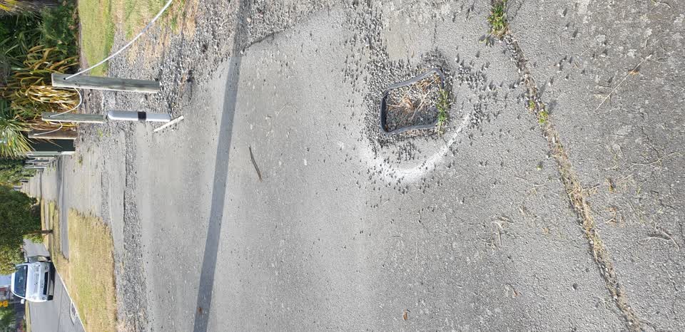 The photograph attached to this street light outage report