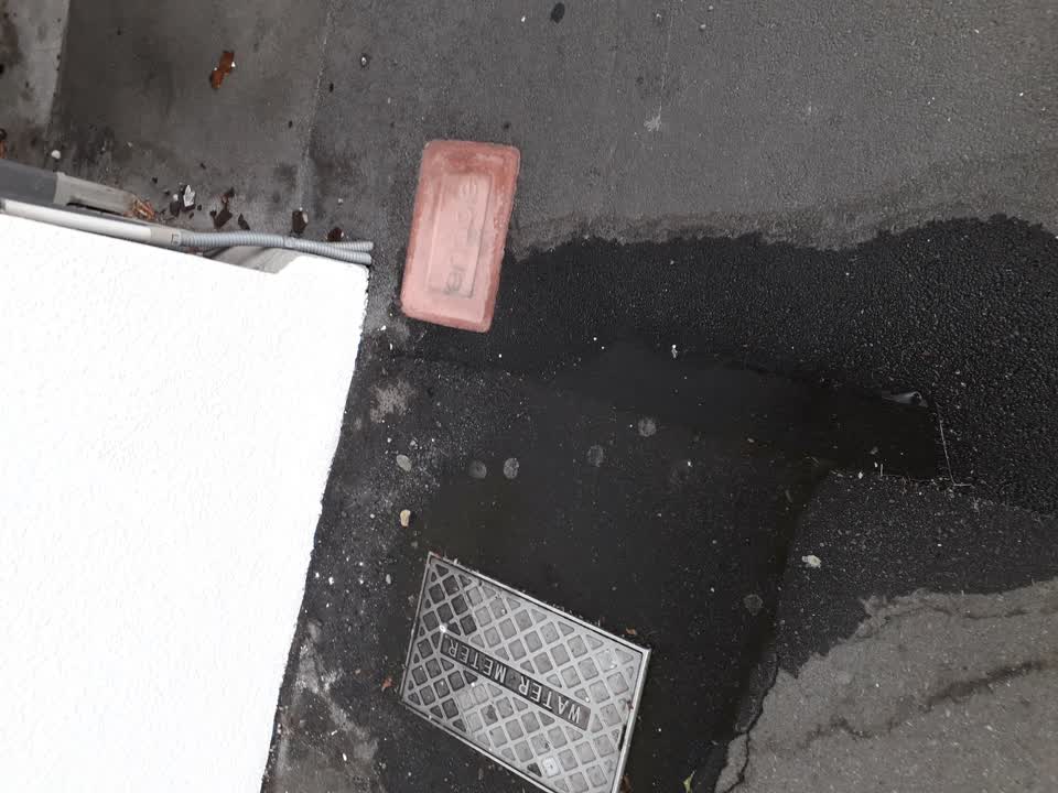 The photograph attached to this water leak report