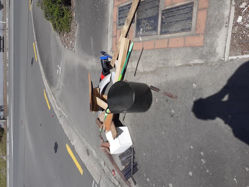 The photograph attached to this rubbish/recycling report