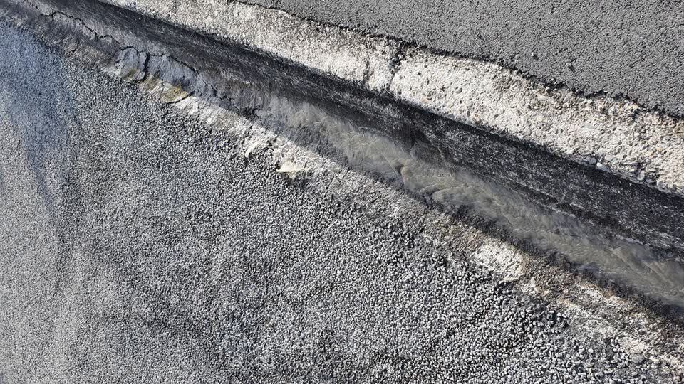 The photograph attached to this water leak report