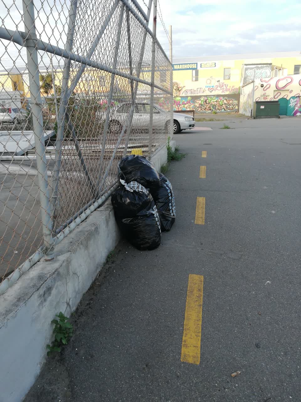 The photograph attached to this rubbish/recycling report