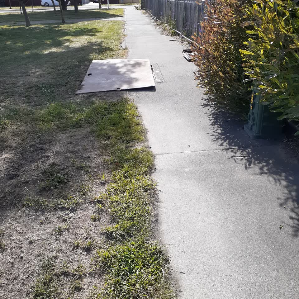 The photograph attached to this street light outage report