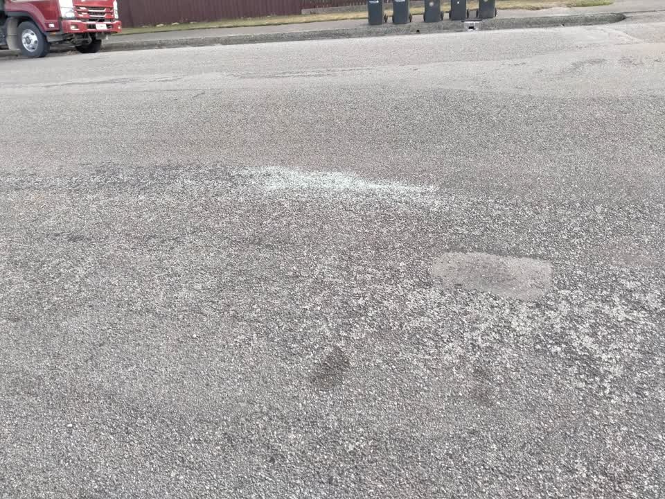 The photograph attached to this roading/streets report