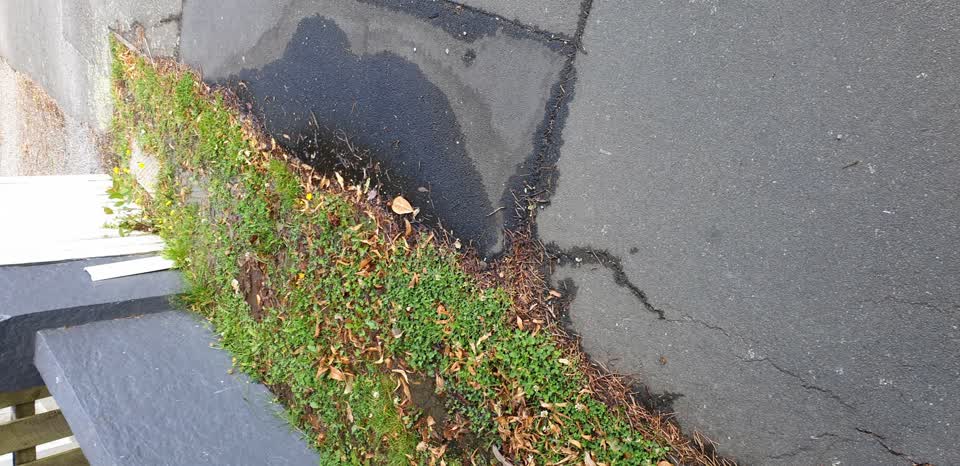 The photograph attached to this water leak report