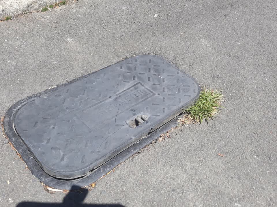 The photograph attached to this street light outage report
