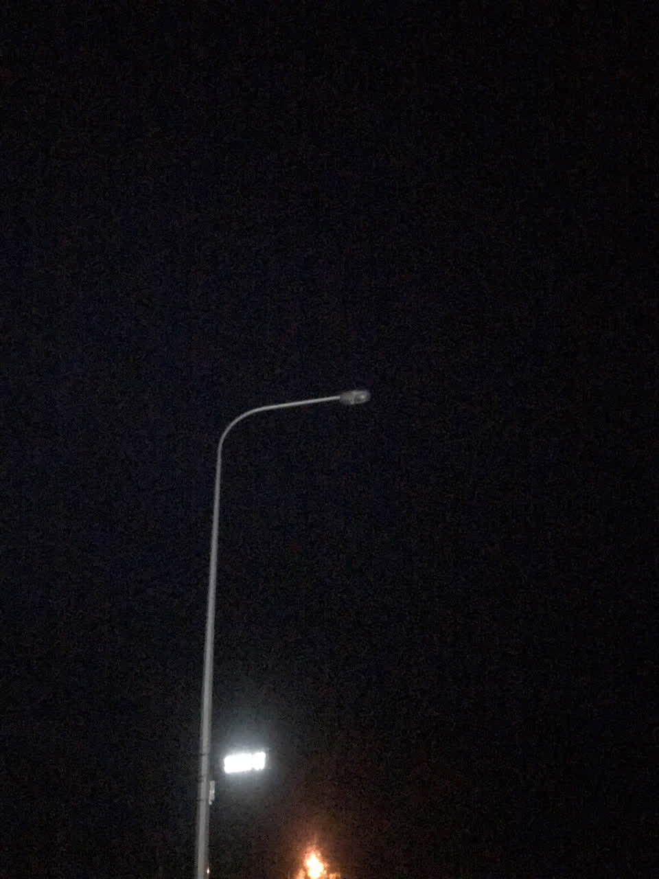 The photograph attached to this street light outage report