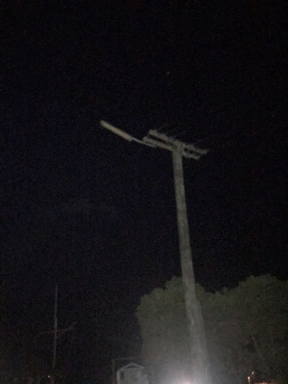 The photograph attached to this street light outage report