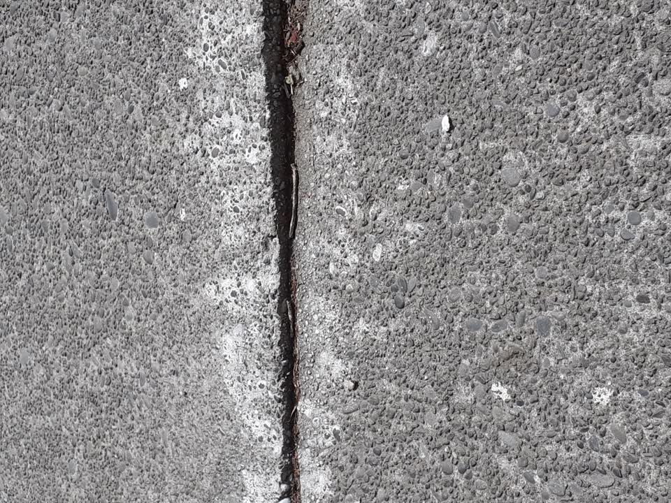 The photograph attached to this street light outage report