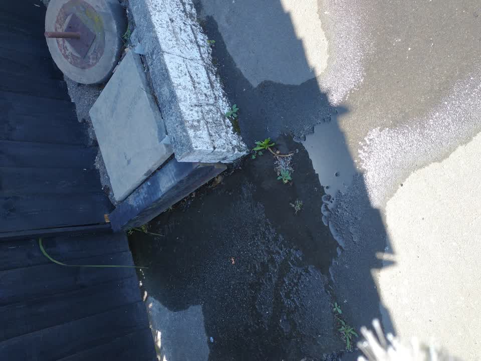 The photograph attached to this water leak report