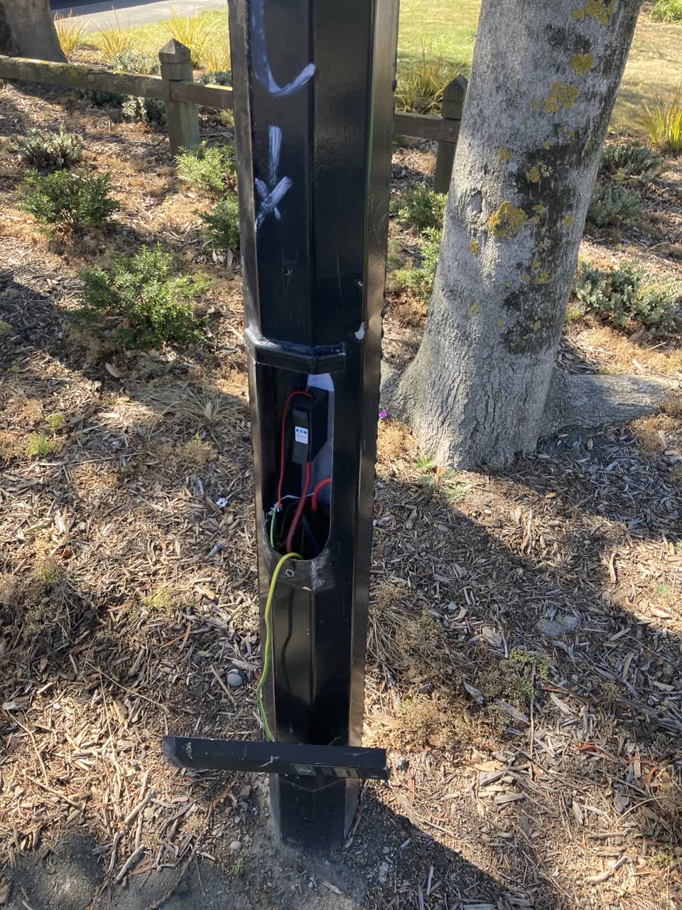 The photograph attached to this street light outage report