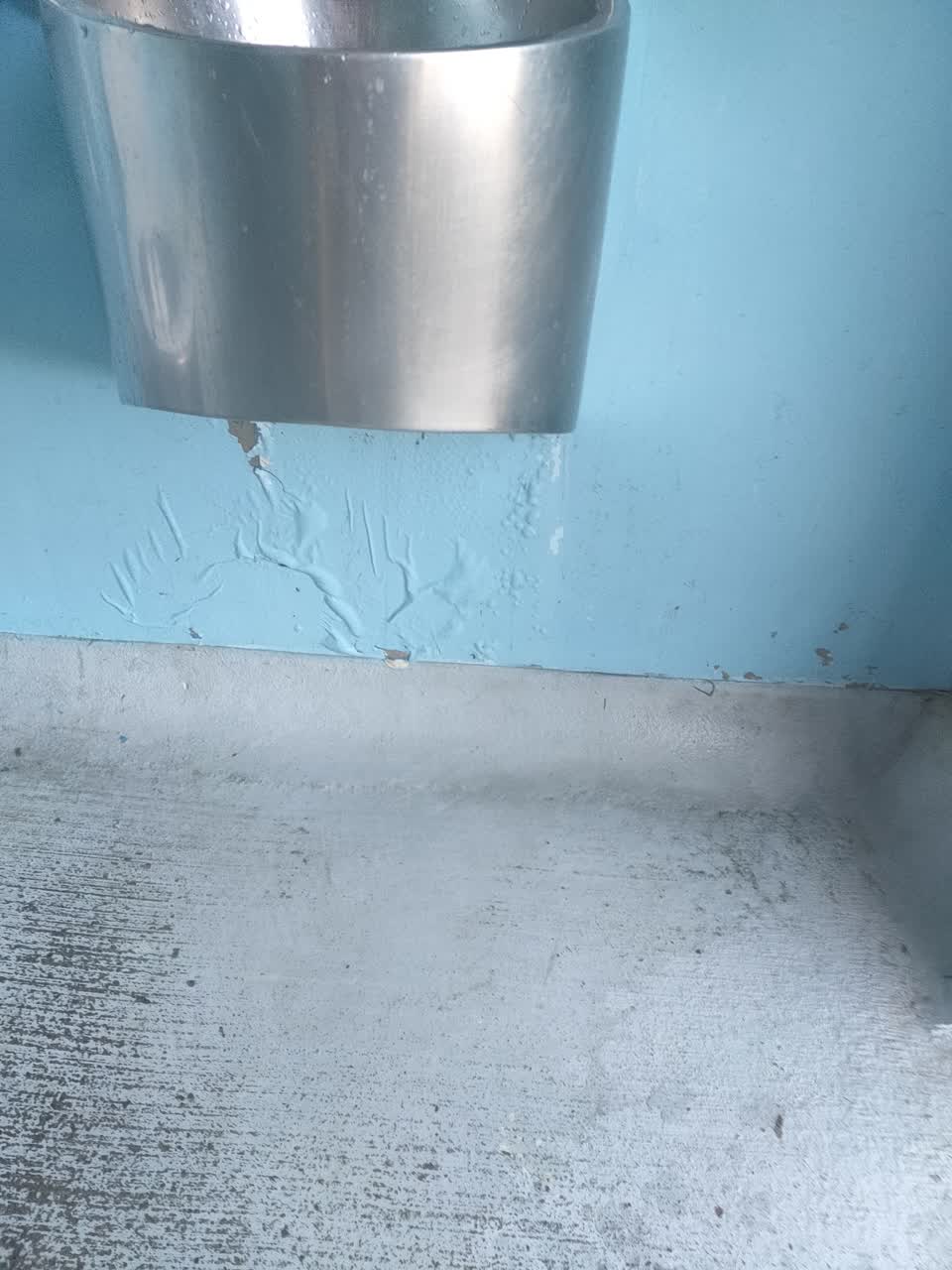 The photograph attached to this water leak report