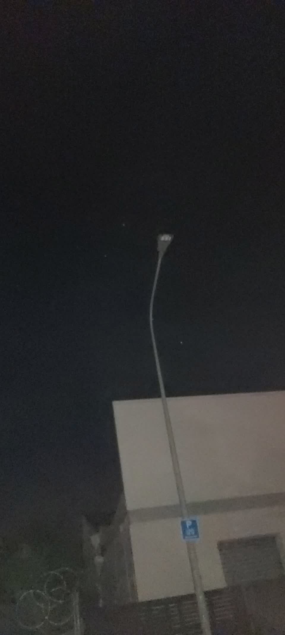 The photograph attached to this street light outage report