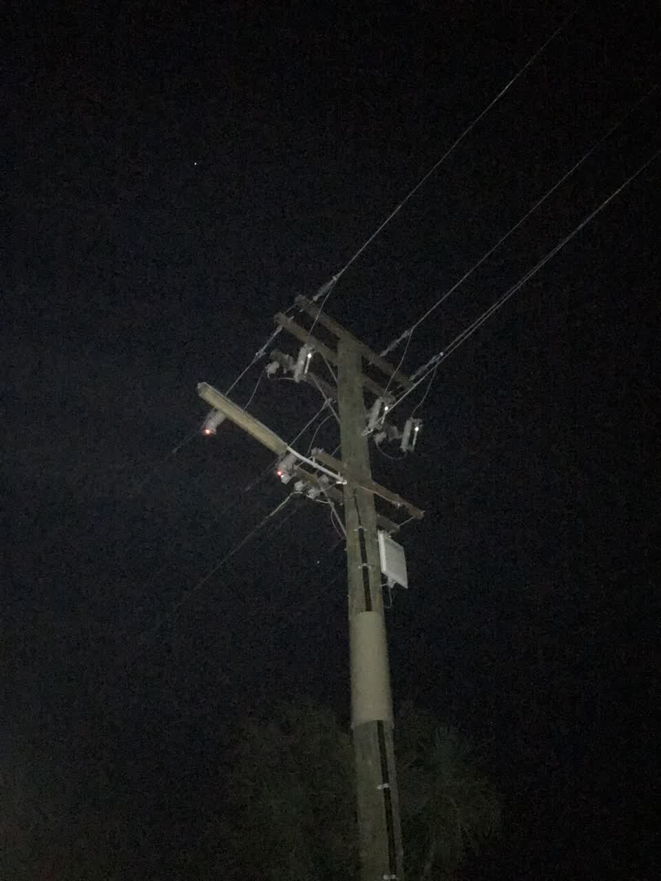 The photograph attached to this street light outage report