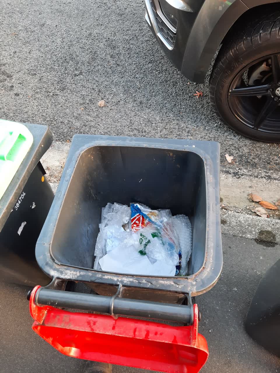 The photograph attached to this rubbish/recycling report