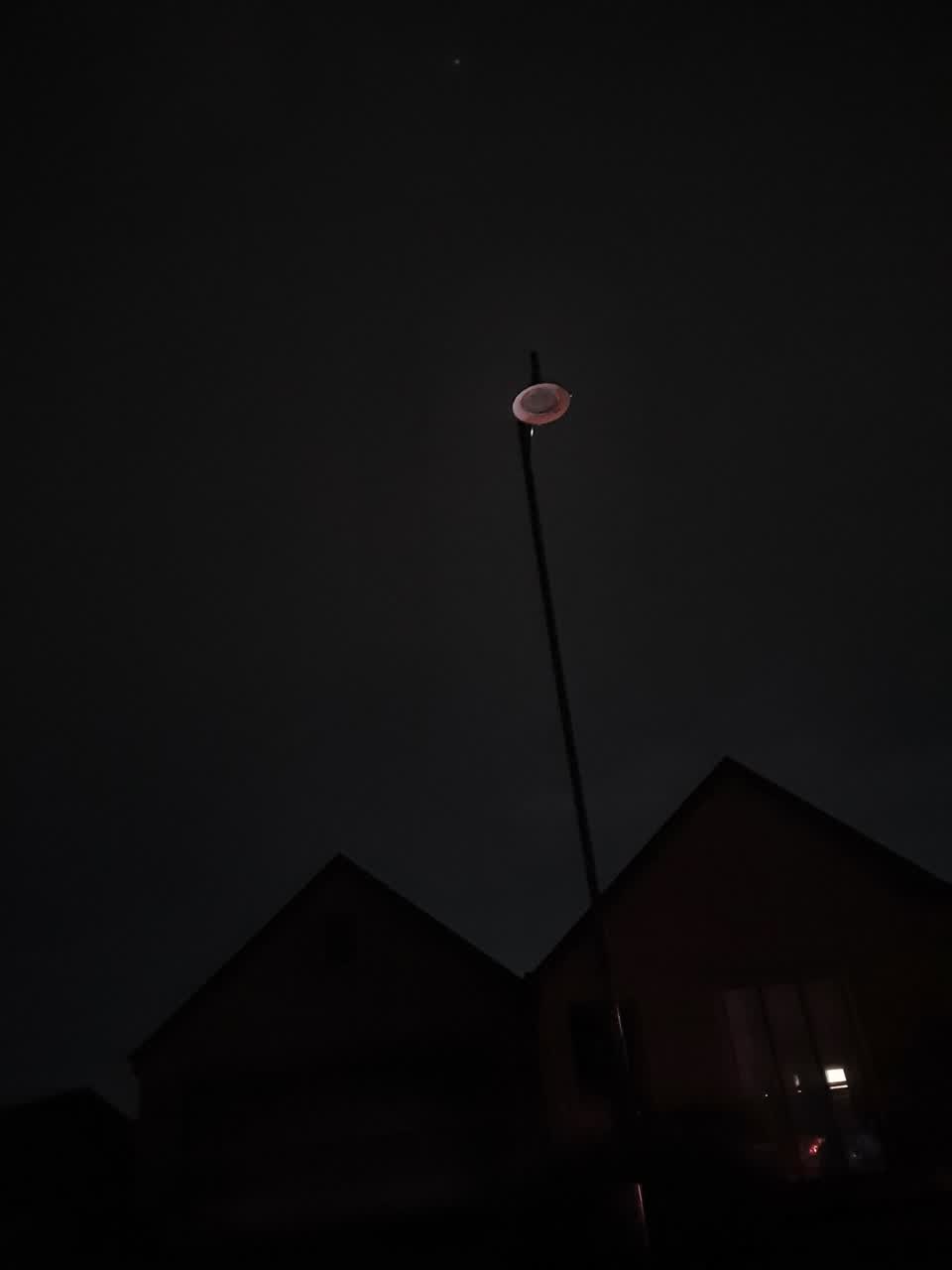 The photograph attached to this street light outage report