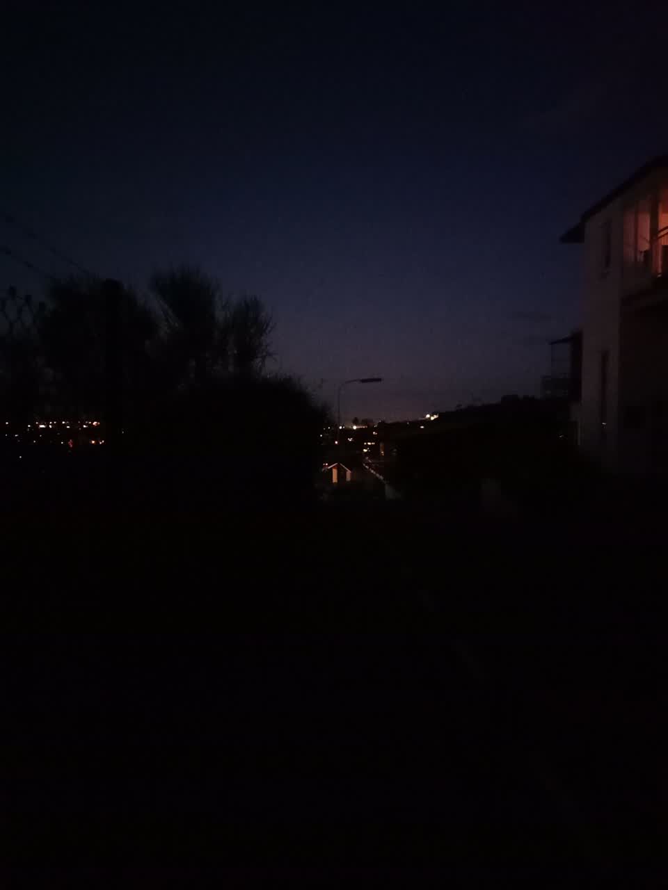 The photograph attached to this street light outage report