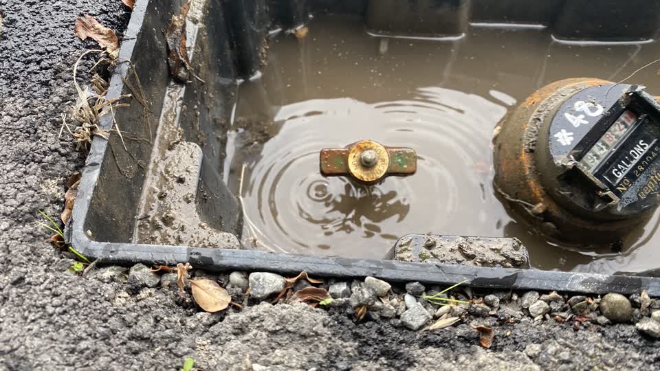 The photograph attached to this water leak report