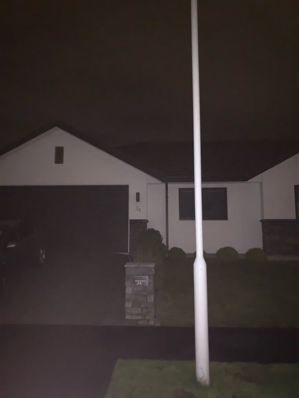 The photograph attached to this street light outage report