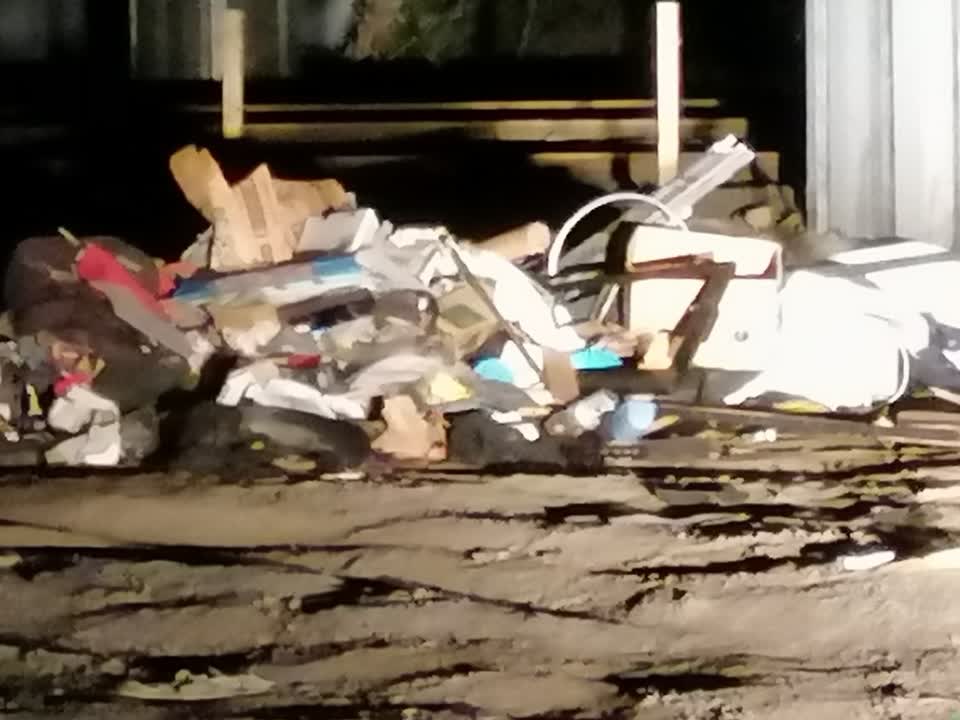 The photograph attached to this rubbish/recycling report